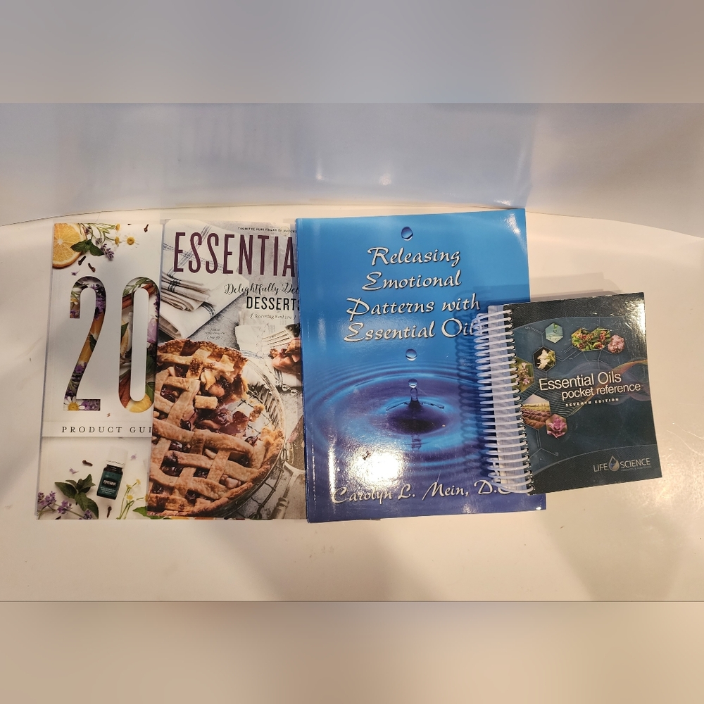 Lot Of 4 Guide Books For Using Young Living Essential Oils.